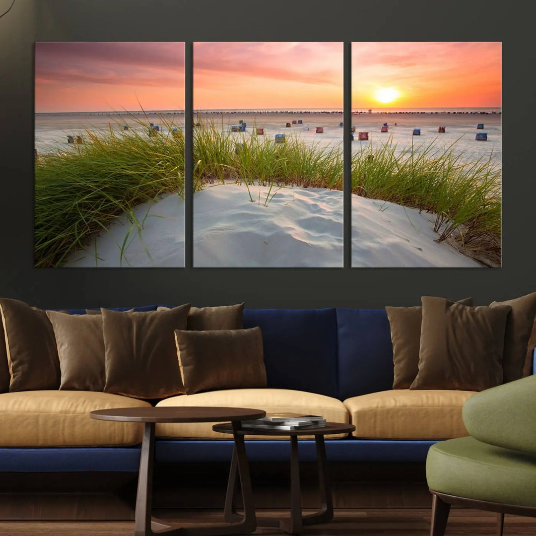 The Ocean Beach Wall Art Canvas Print beautifully captures a sunset over the beach and adds a coastal decor vibe to the space.