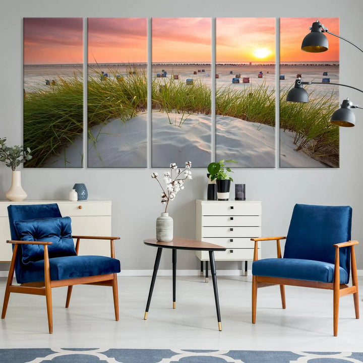 The Ocean Beach Wall Art Canvas Print beautifully captures a sunset over the beach and adds a coastal decor vibe to the space.