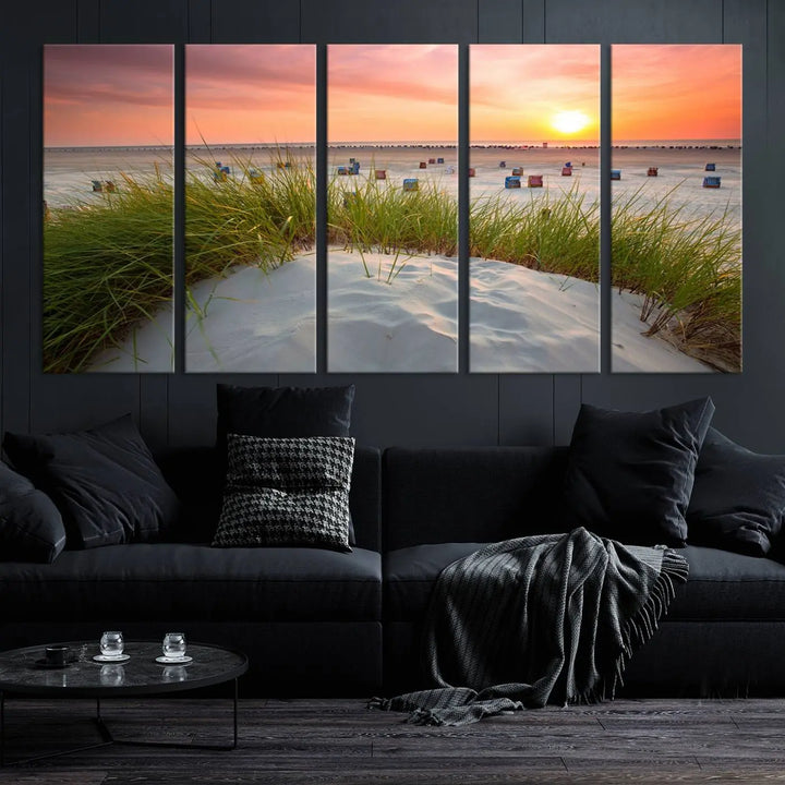 The Ocean Beach Wall Art Canvas Print beautifully captures a sunset over the beach and adds a coastal decor vibe to the space.