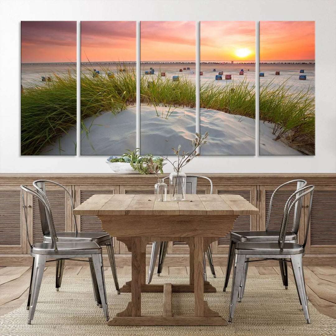 The Ocean Beach Wall Art Canvas Print beautifully captures a sunset over the beach and adds a coastal decor vibe to the space.