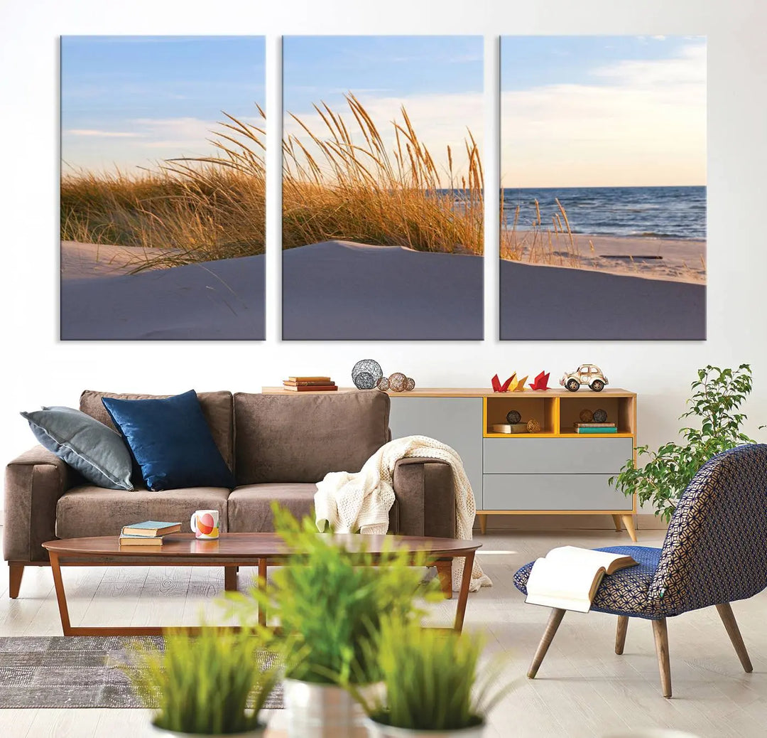 The living room is enhanced by the Ocean Beach Wall Art Canvas Print Sunset Artwork Print Coastal Wall Art, which is displayed prominently above the sofa.