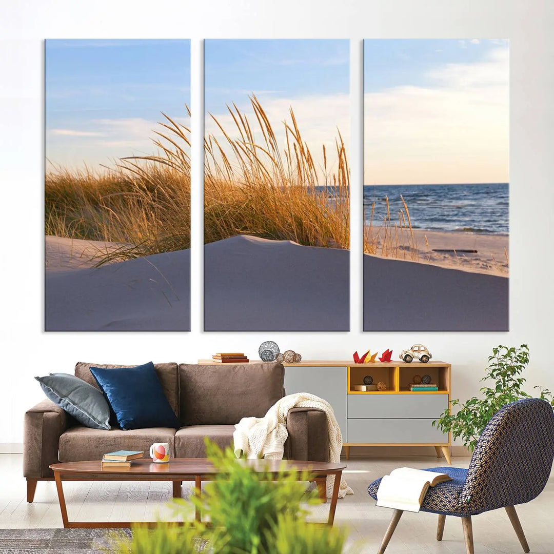 The living room is enhanced by the Ocean Beach Wall Art Canvas Print Sunset Artwork Print Coastal Wall Art, which is displayed prominently above the sofa.