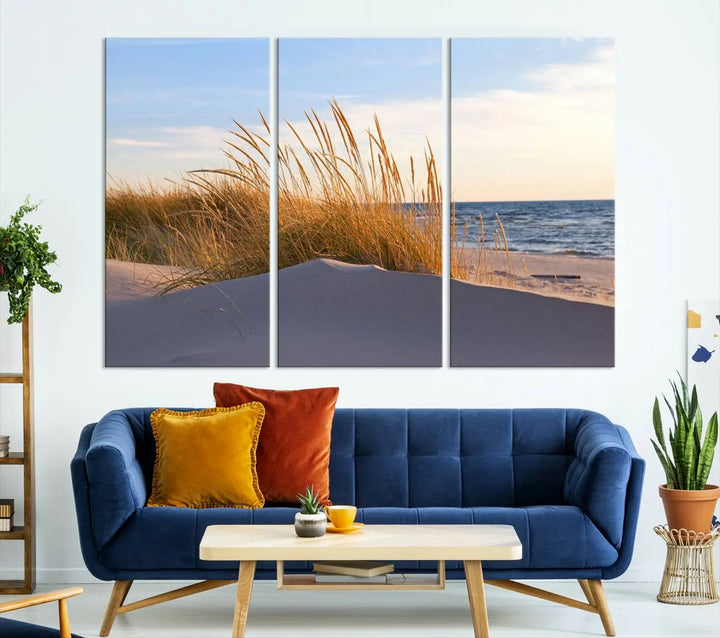 The living room is enhanced by the Ocean Beach Wall Art Canvas Print Sunset Artwork Print Coastal Wall Art, which is displayed prominently above the sofa.