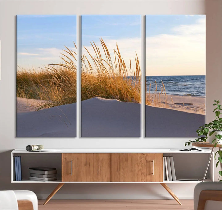 The living room is enhanced by the Ocean Beach Wall Art Canvas Print Sunset Artwork Print Coastal Wall Art, which is displayed prominently above the sofa.