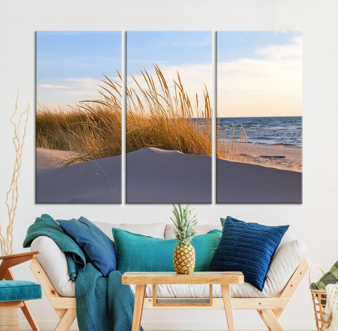 The living room is enhanced by the Ocean Beach Wall Art Canvas Print Sunset Artwork Print Coastal Wall Art, which is displayed prominently above the sofa.