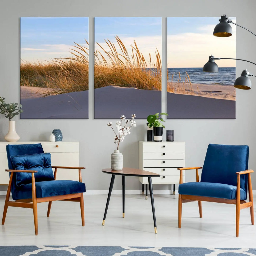 The living room is enhanced by the Ocean Beach Wall Art Canvas Print Sunset Artwork Print Coastal Wall Art, which is displayed prominently above the sofa.