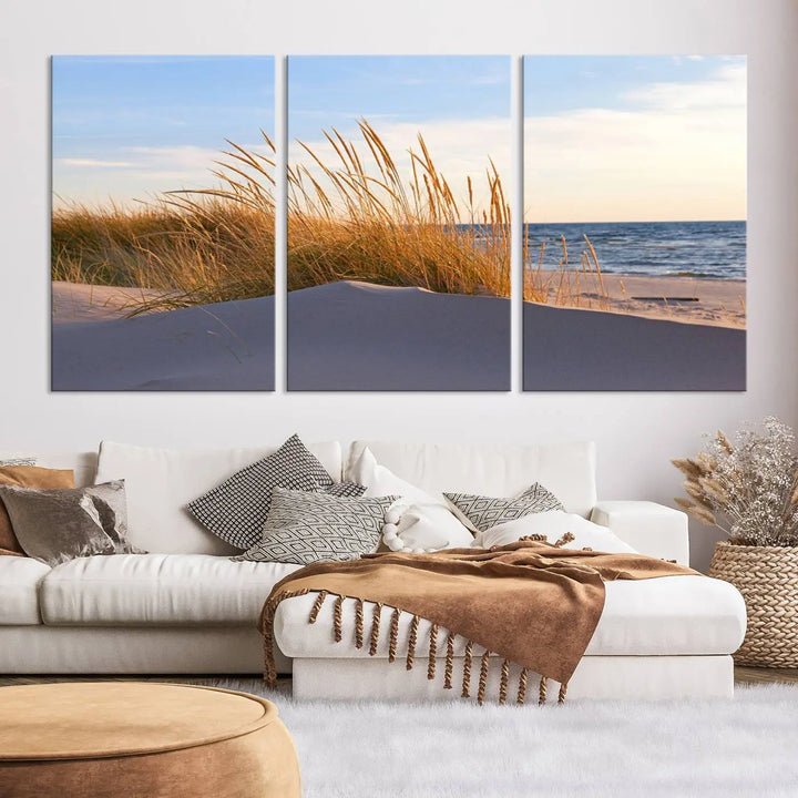 The living room is enhanced by the Ocean Beach Wall Art Canvas Print Sunset Artwork Print Coastal Wall Art, which is displayed prominently above the sofa.