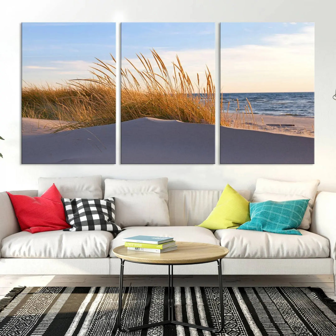 The living room is enhanced by the Ocean Beach Wall Art Canvas Print Sunset Artwork Print Coastal Wall Art, which is displayed prominently above the sofa.