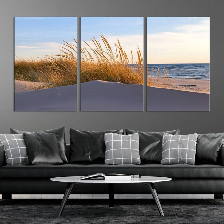 The living room is enhanced by the Ocean Beach Wall Art Canvas Print Sunset Artwork Print Coastal Wall Art, which is displayed prominently above the sofa.