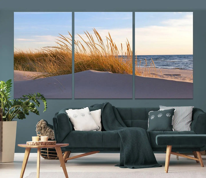 The living room is enhanced by the Ocean Beach Wall Art Canvas Print Sunset Artwork Print Coastal Wall Art, which is displayed prominently above the sofa.