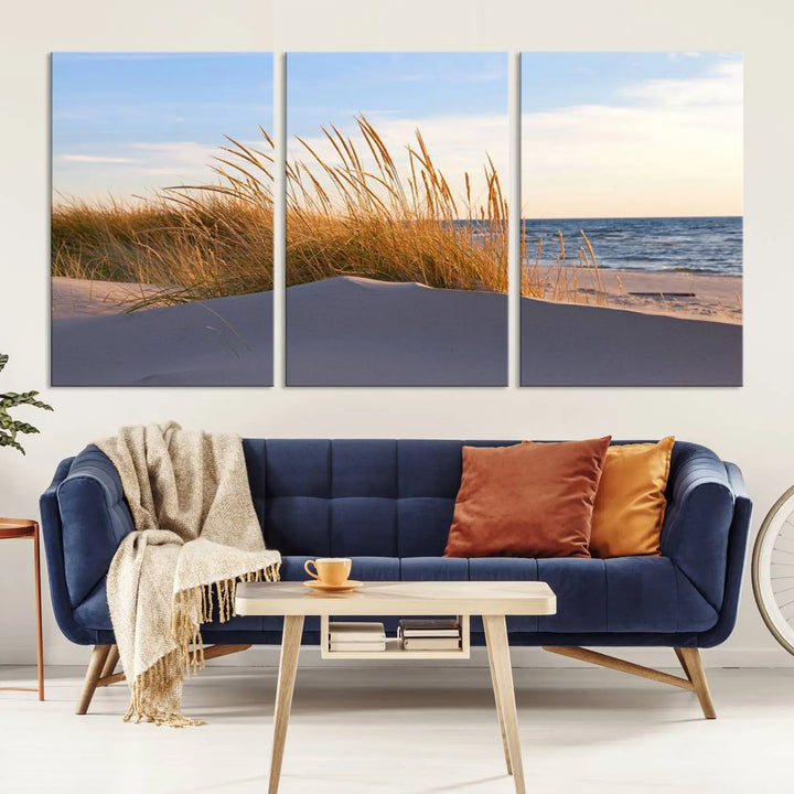 The living room is enhanced by the Ocean Beach Wall Art Canvas Print Sunset Artwork Print Coastal Wall Art, which is displayed prominently above the sofa.