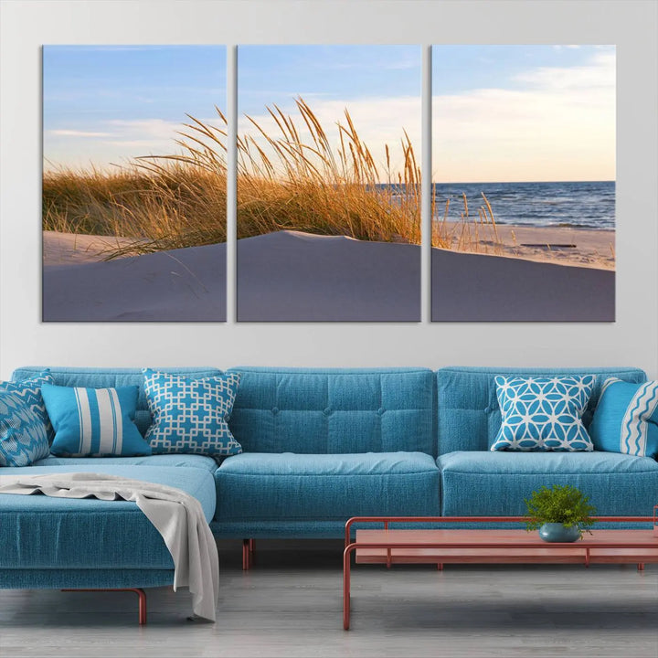 The living room is enhanced by the Ocean Beach Wall Art Canvas Print Sunset Artwork Print Coastal Wall Art, which is displayed prominently above the sofa.