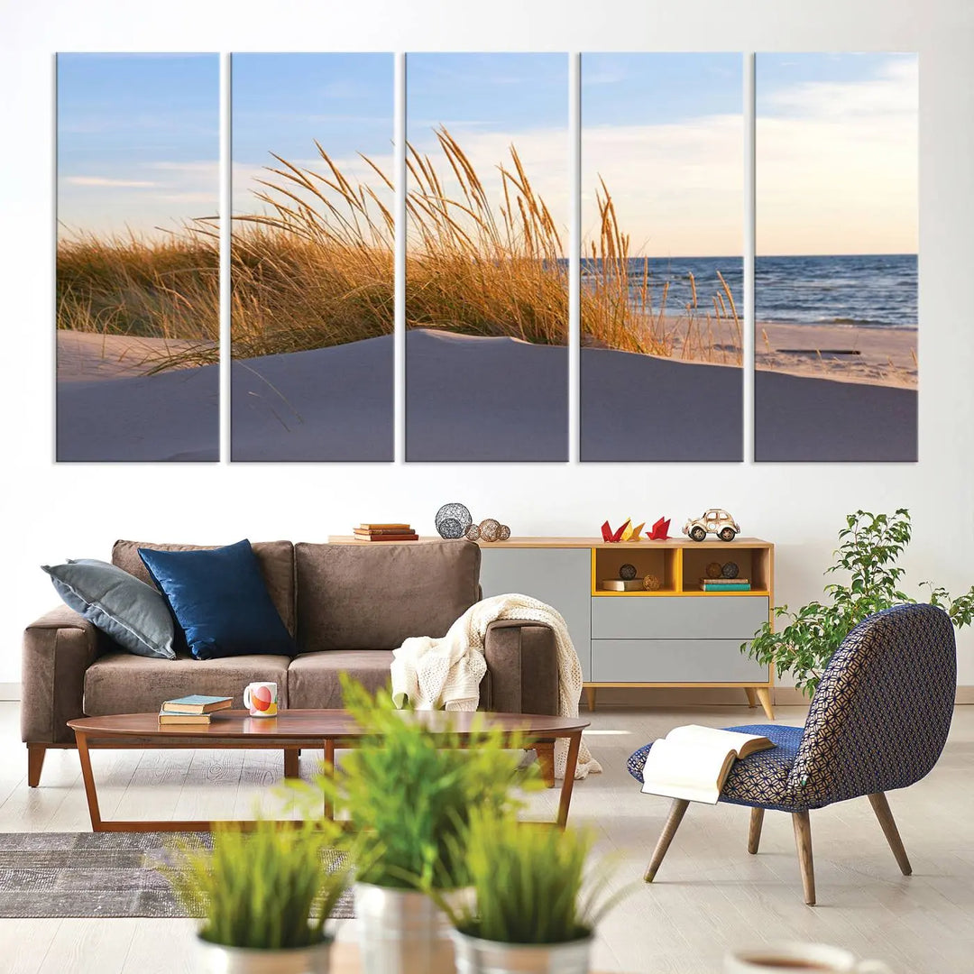 The living room is enhanced by the Ocean Beach Wall Art Canvas Print Sunset Artwork Print Coastal Wall Art, which is displayed prominently above the sofa.