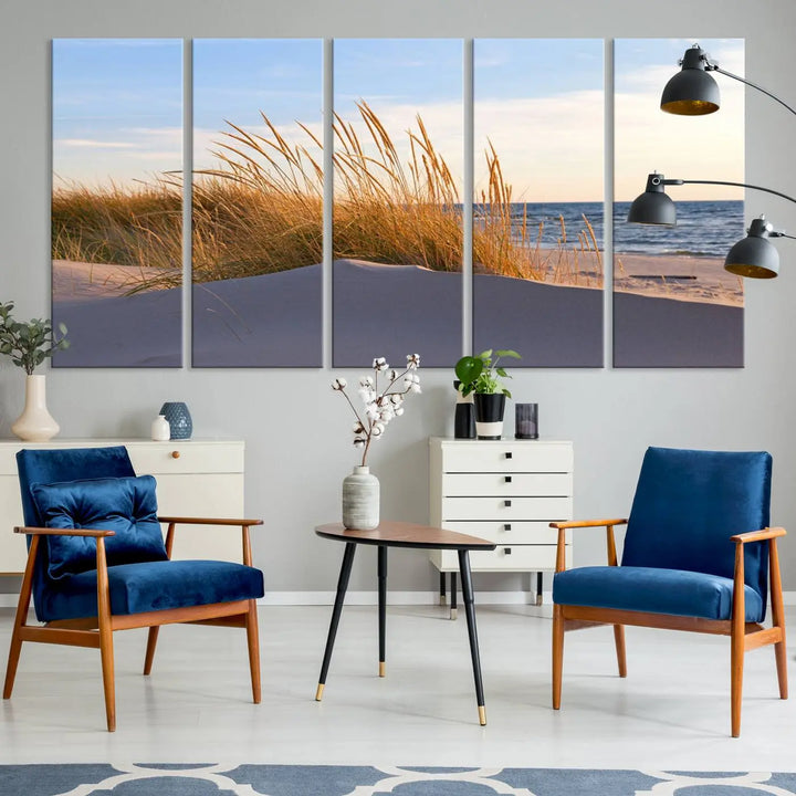 The living room is enhanced by the Ocean Beach Wall Art Canvas Print Sunset Artwork Print Coastal Wall Art, which is displayed prominently above the sofa.