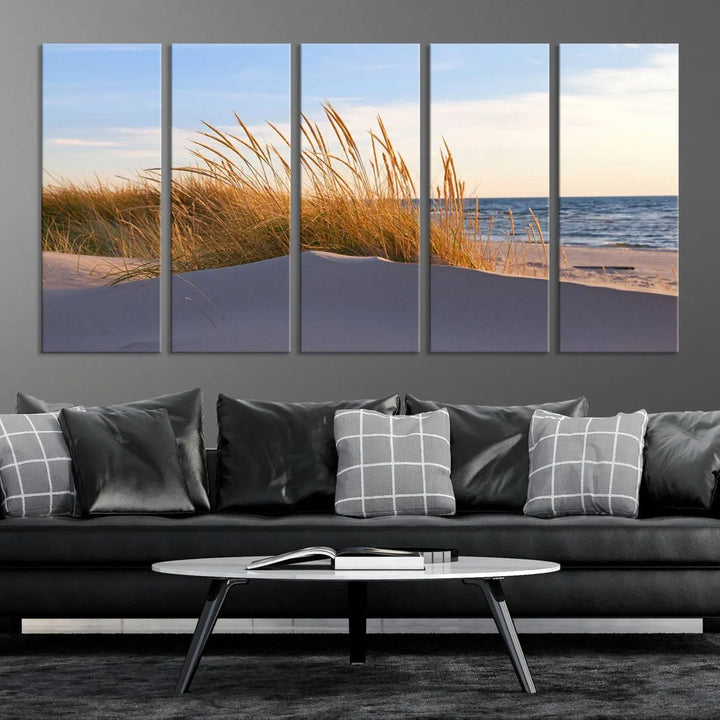 The living room is enhanced by the Ocean Beach Wall Art Canvas Print Sunset Artwork Print Coastal Wall Art, which is displayed prominently above the sofa.