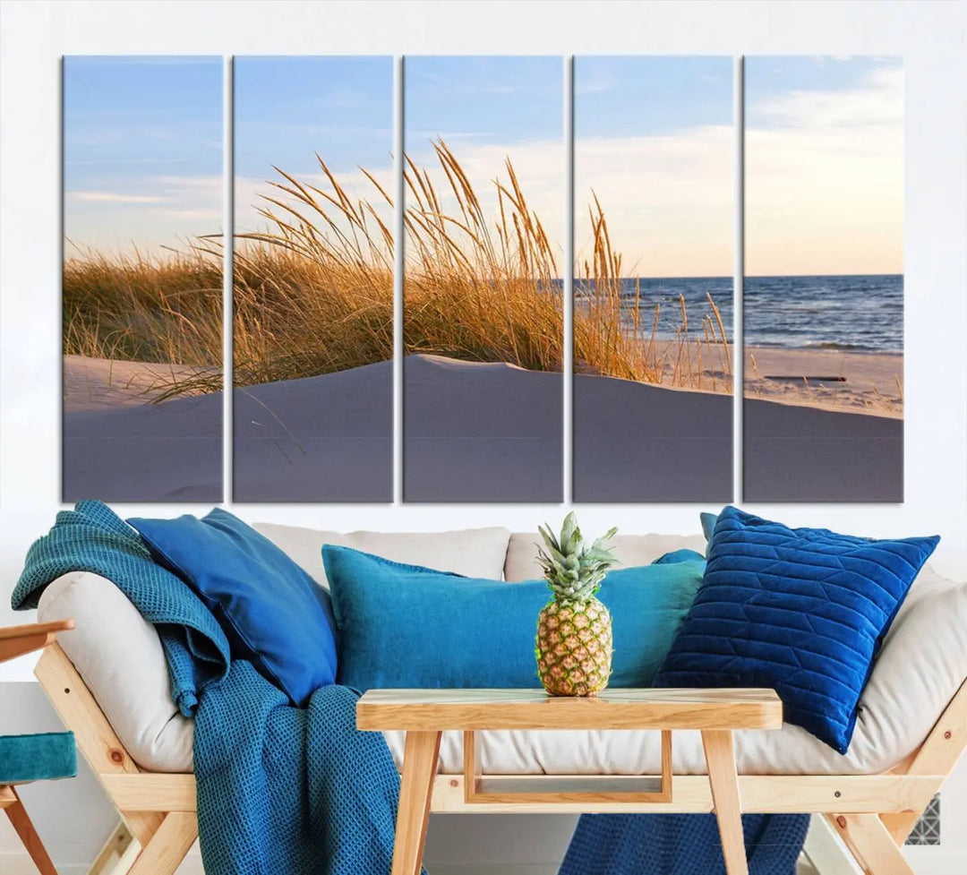 The living room is enhanced by the Ocean Beach Wall Art Canvas Print Sunset Artwork Print Coastal Wall Art, which is displayed prominently above the sofa.