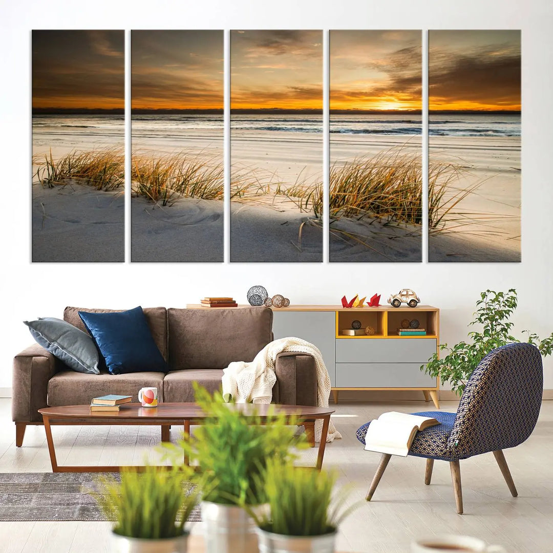 The Ocean Beach Wall Art Canvas Print, a captivating triptych showcasing a sunset over the beach with grass, hangs gracefully. These gallery-wrapped, museum-quality canvases boast a UV-protective coating that preserves their vibrant colors and stunning detail for years to come.