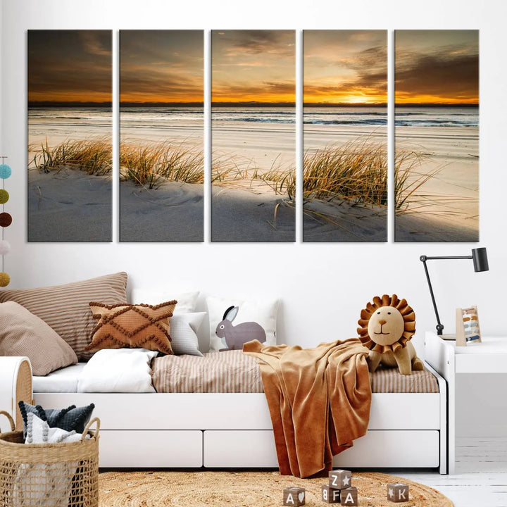 The Ocean Beach Wall Art Canvas Print, a captivating triptych showcasing a sunset over the beach with grass, hangs gracefully. These gallery-wrapped, museum-quality canvases boast a UV-protective coating that preserves their vibrant colors and stunning detail for years to come.