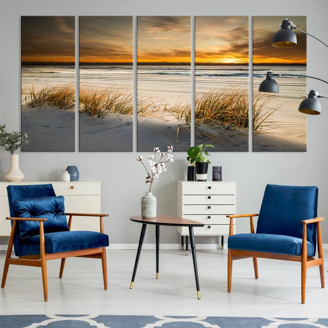 The Ocean Beach Wall Art Canvas Print, a captivating triptych showcasing a sunset over the beach with grass, hangs gracefully. These gallery-wrapped, museum-quality canvases boast a UV-protective coating that preserves their vibrant colors and stunning detail for years to come.