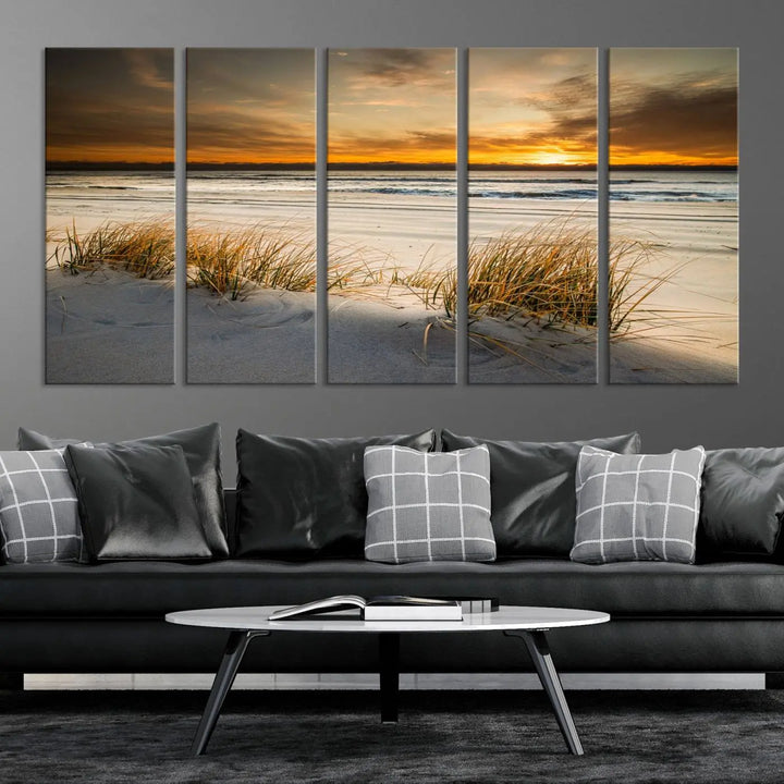 The Ocean Beach Wall Art Canvas Print, a captivating triptych showcasing a sunset over the beach with grass, hangs gracefully. These gallery-wrapped, museum-quality canvases boast a UV-protective coating that preserves their vibrant colors and stunning detail for years to come.