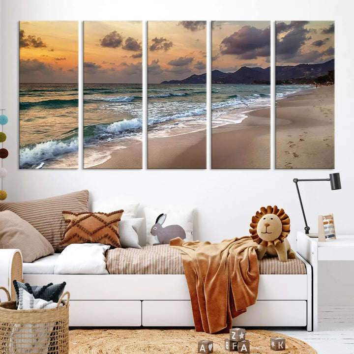 The Ocean Beach Wall Art Canvas Print, a stunning triptych featuring sunset artwork that captures waves and footprints on the sand, beautifully enhances any coastal decor.