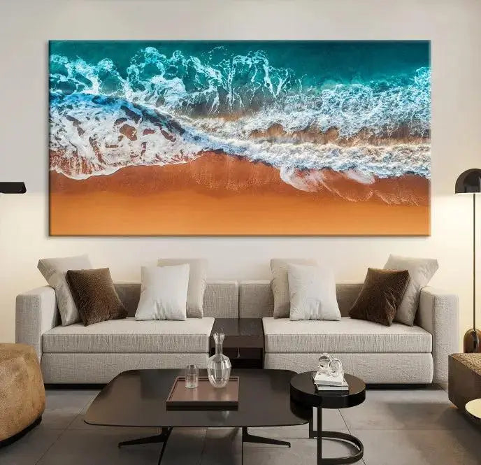 The "Ocean Beach Wall Art Nautical Landscape Canvas Print" is a stunning triptych of aerial ocean waves on museum-quality canvas with UV-protective coating. It's ready to hang and can instantly transform your space.