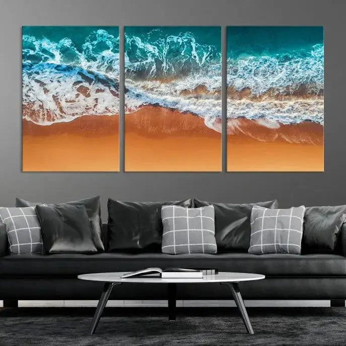 The "Ocean Beach Wall Art Nautical Landscape Canvas Print" is a stunning triptych of aerial ocean waves on museum-quality canvas with UV-protective coating. It's ready to hang and can instantly transform your space.