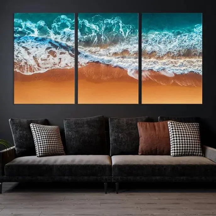 The "Ocean Beach Wall Art Nautical Landscape Canvas Print" is a stunning triptych of aerial ocean waves on museum-quality canvas with UV-protective coating. It's ready to hang and can instantly transform your space.