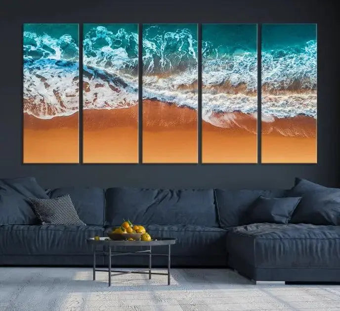 The "Ocean Beach Wall Art Nautical Landscape Canvas Print" is a stunning triptych of aerial ocean waves on museum-quality canvas with UV-protective coating. It's ready to hang and can instantly transform your space.