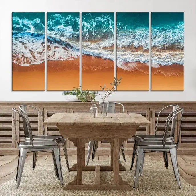 The "Ocean Beach Wall Art Nautical Landscape Canvas Print" is a stunning triptych of aerial ocean waves on museum-quality canvas with UV-protective coating. It's ready to hang and can instantly transform your space.