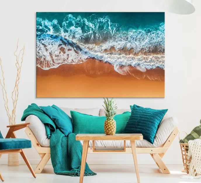 The "Ocean Beach Wall Art Nautical Landscape Canvas Print" is a stunning triptych of aerial ocean waves on museum-quality canvas with UV-protective coating. It's ready to hang and can instantly transform your space.