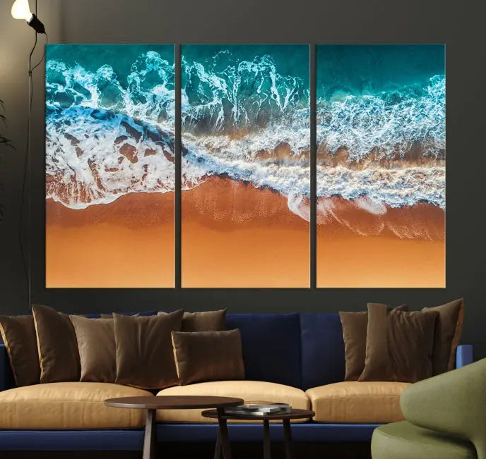 The "Ocean Beach Wall Art Nautical Landscape Canvas Print" is a stunning triptych of aerial ocean waves on museum-quality canvas with UV-protective coating. It's ready to hang and can instantly transform your space.