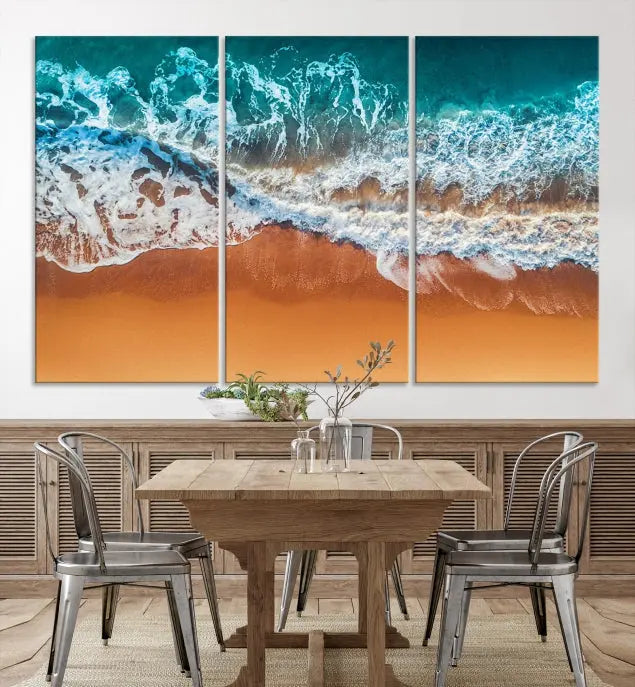 The "Ocean Beach Wall Art Nautical Landscape Canvas Print" is a stunning triptych of aerial ocean waves on museum-quality canvas with UV-protective coating. It's ready to hang and can instantly transform your space.