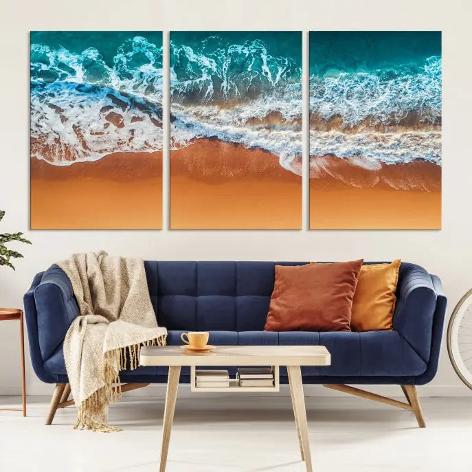 The "Ocean Beach Wall Art Nautical Landscape Canvas Print" is a stunning triptych of aerial ocean waves on museum-quality canvas with UV-protective coating. It's ready to hang and can instantly transform your space.