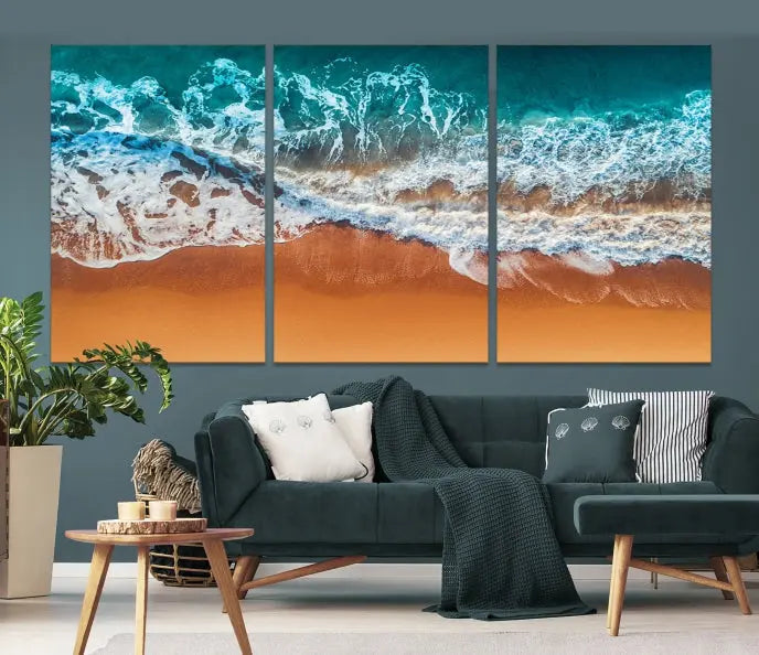 The "Ocean Beach Wall Art Nautical Landscape Canvas Print" is a stunning triptych of aerial ocean waves on museum-quality canvas with UV-protective coating. It's ready to hang and can instantly transform your space.