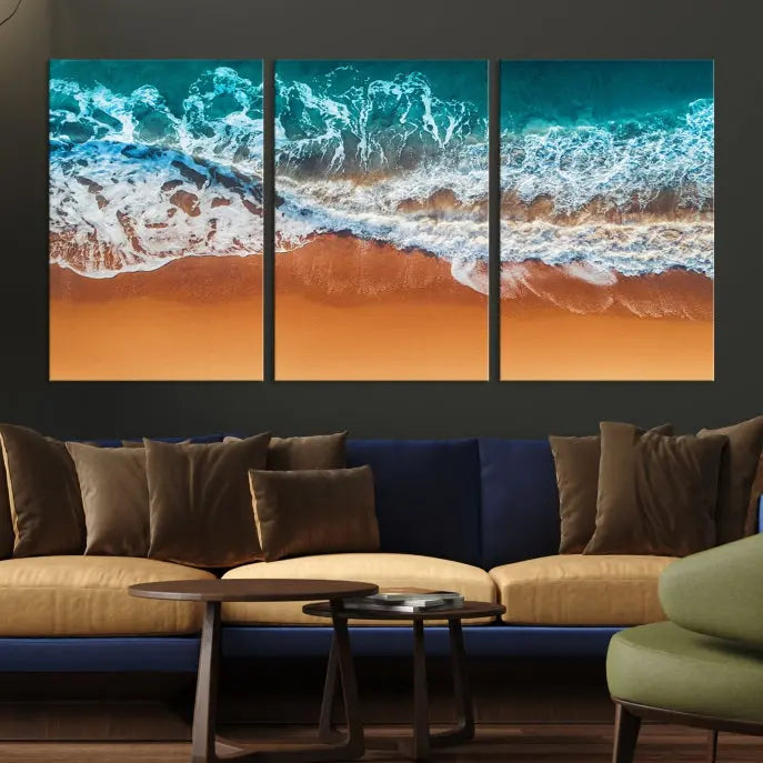 The "Ocean Beach Wall Art Nautical Landscape Canvas Print" is a stunning triptych of aerial ocean waves on museum-quality canvas with UV-protective coating. It's ready to hang and can instantly transform your space.