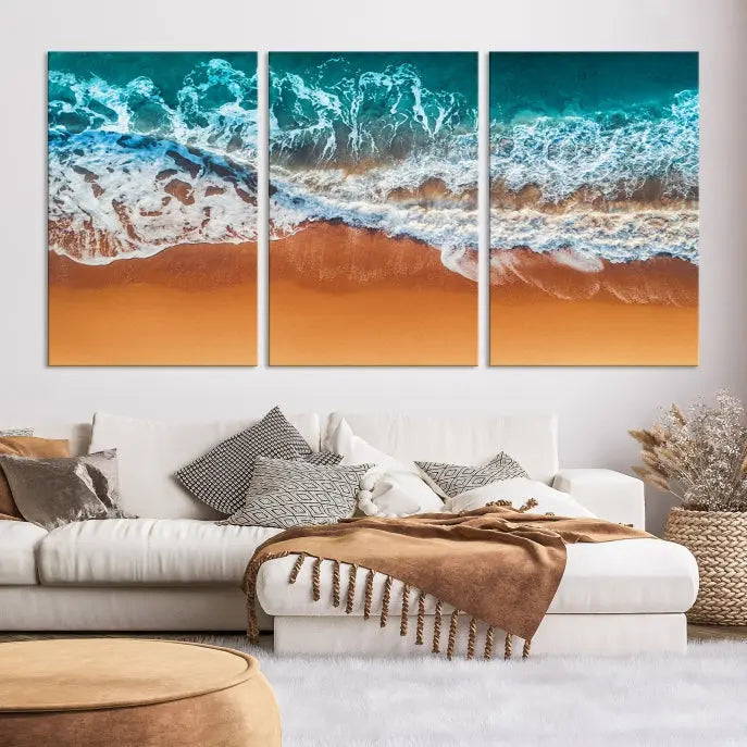 The "Ocean Beach Wall Art Nautical Landscape Canvas Print" is a stunning triptych of aerial ocean waves on museum-quality canvas with UV-protective coating. It's ready to hang and can instantly transform your space.