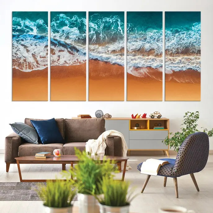 The "Ocean Beach Wall Art Nautical Landscape Canvas Print" is a stunning triptych of aerial ocean waves on museum-quality canvas with UV-protective coating. It's ready to hang and can instantly transform your space.