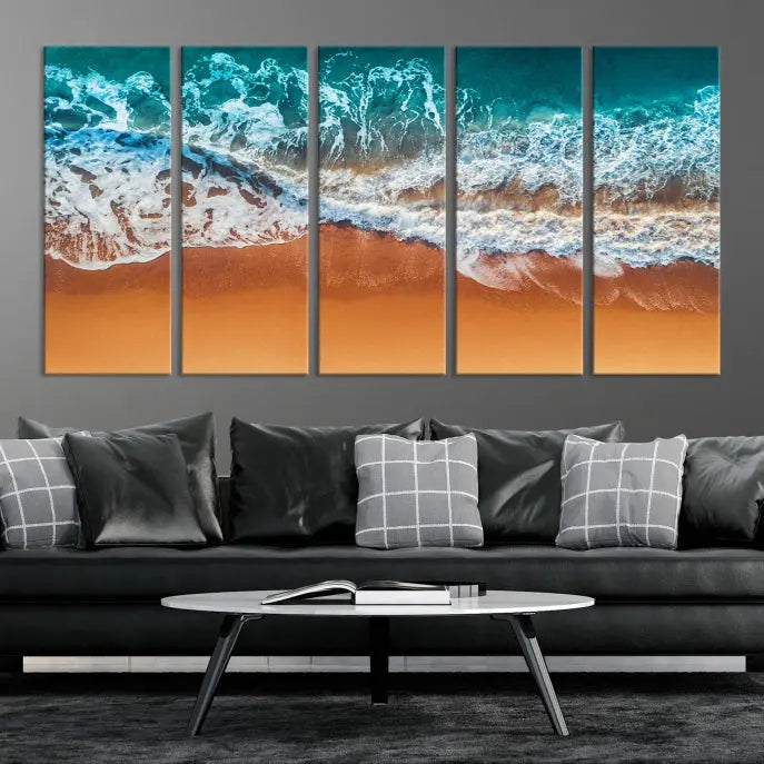 The "Ocean Beach Wall Art Nautical Landscape Canvas Print" is a stunning triptych of aerial ocean waves on museum-quality canvas with UV-protective coating. It's ready to hang and can instantly transform your space.