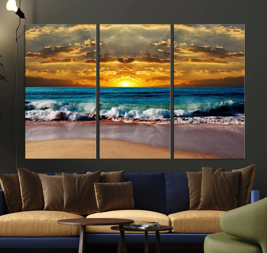 The Ocean Sunrise Over Golden Beach Waves giclee canvas wall art set hangs above, capturing a serene coastal sunset. This high-quality stretched canvas print brings warmth and tranquility to any living space.