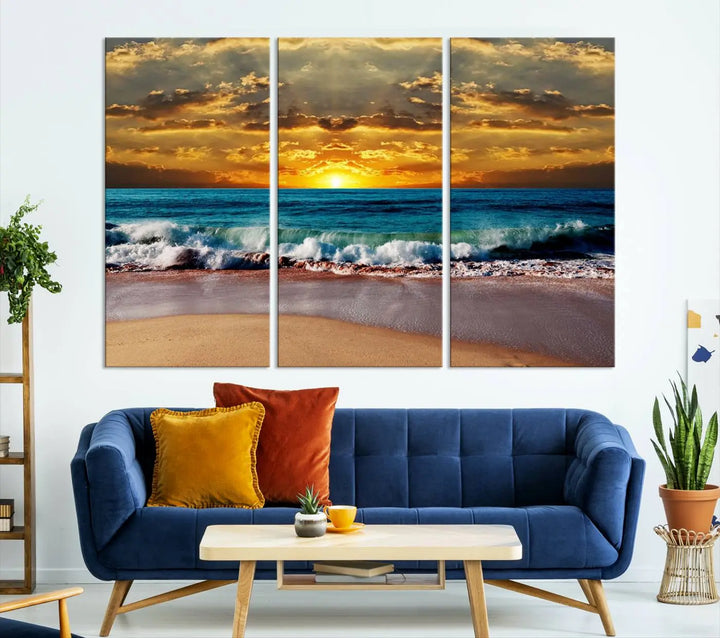 The Ocean Sunrise Over Golden Beach Waves giclee canvas wall art set hangs above, capturing a serene coastal sunset. This high-quality stretched canvas print brings warmth and tranquility to any living space.