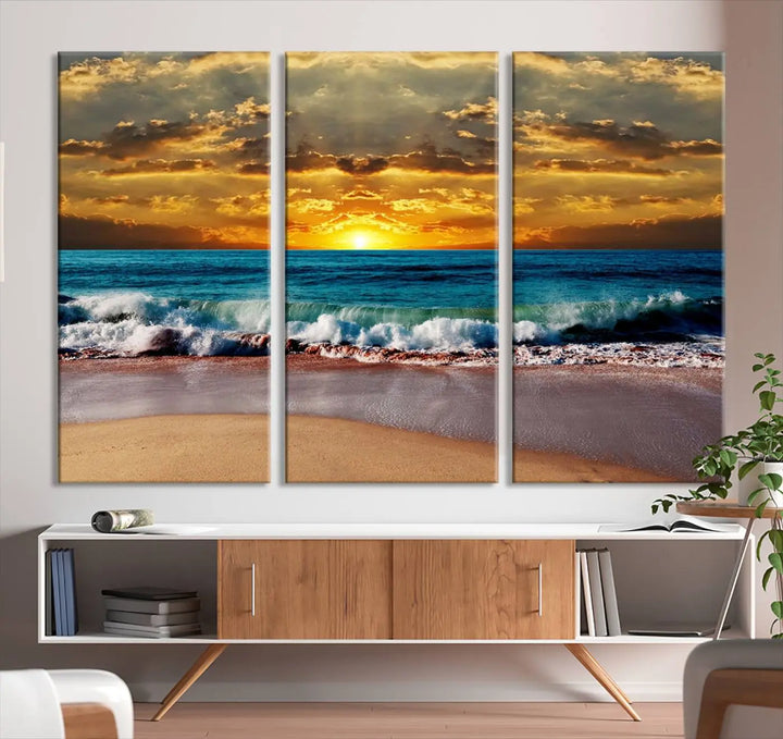 The Ocean Sunrise Over Golden Beach Waves giclee canvas wall art set hangs above, capturing a serene coastal sunset. This high-quality stretched canvas print brings warmth and tranquility to any living space.