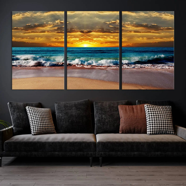 The Ocean Sunrise Over Golden Beach Waves giclee canvas wall art set hangs above, capturing a serene coastal sunset. This high-quality stretched canvas print brings warmth and tranquility to any living space.