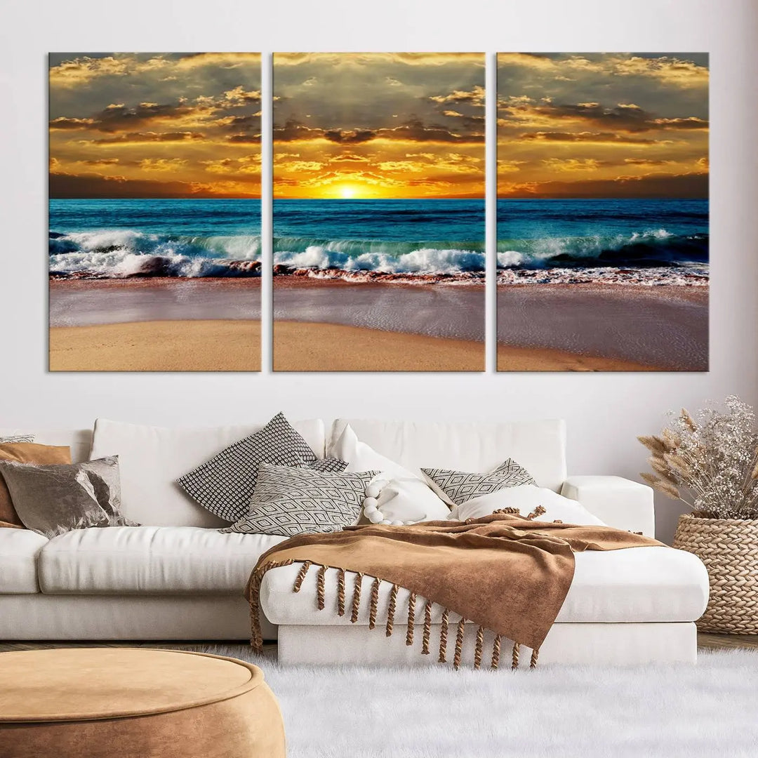 The Ocean Sunrise Over Golden Beach Waves giclee canvas wall art set hangs above, capturing a serene coastal sunset. This high-quality stretched canvas print brings warmth and tranquility to any living space.