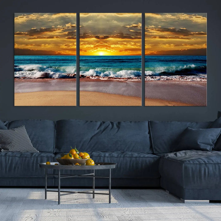 The Ocean Sunrise Over Golden Beach Waves giclee canvas wall art set hangs above, capturing a serene coastal sunset. This high-quality stretched canvas print brings warmth and tranquility to any living space.