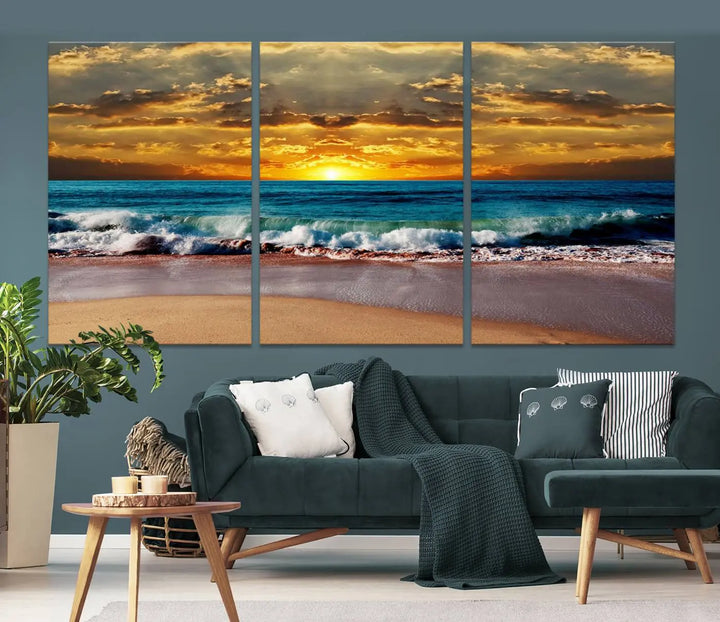 The Ocean Sunrise Over Golden Beach Waves giclee canvas wall art set hangs above, capturing a serene coastal sunset. This high-quality stretched canvas print brings warmth and tranquility to any living space.