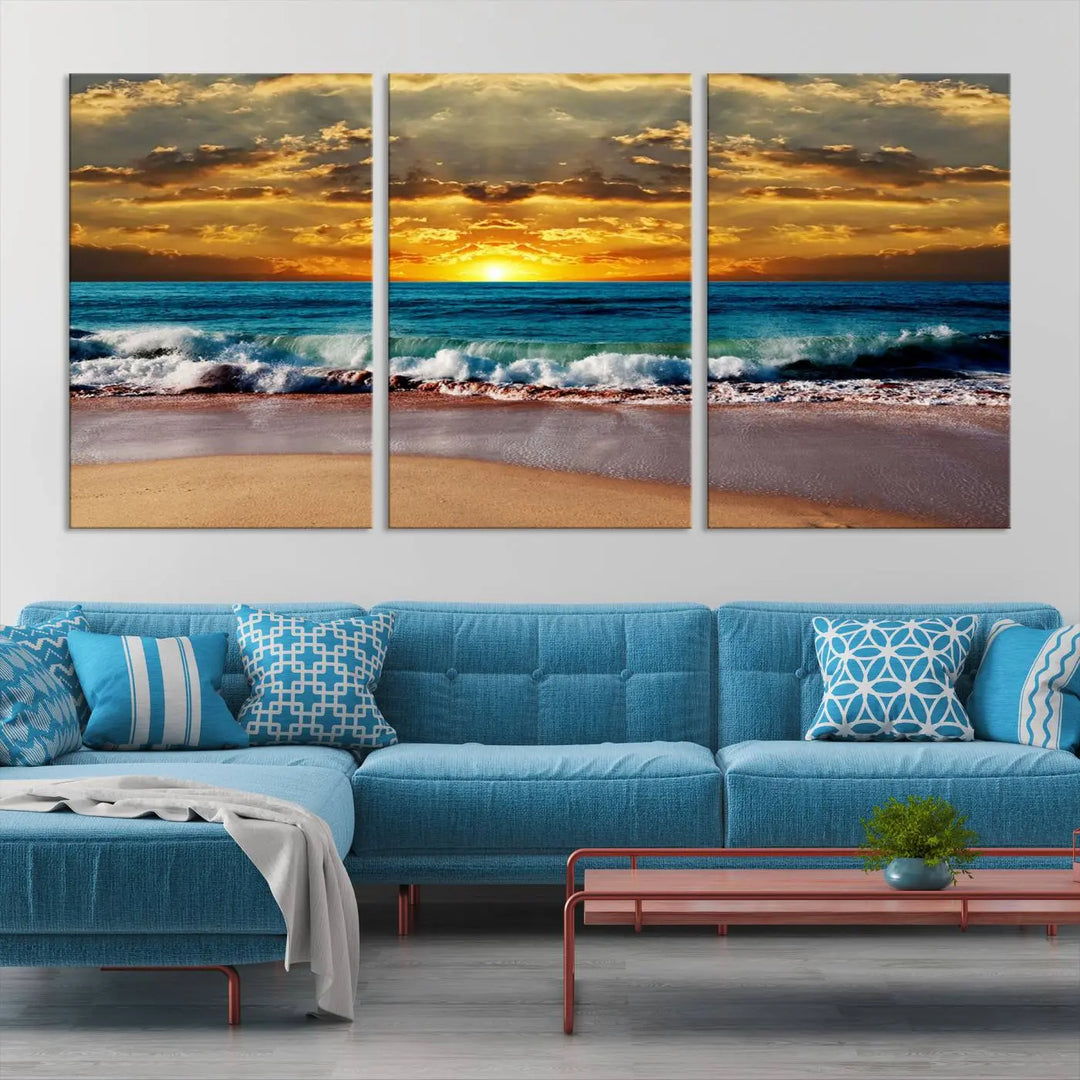 The Ocean Sunrise Over Golden Beach Waves giclee canvas wall art set hangs above, capturing a serene coastal sunset. This high-quality stretched canvas print brings warmth and tranquility to any living space.