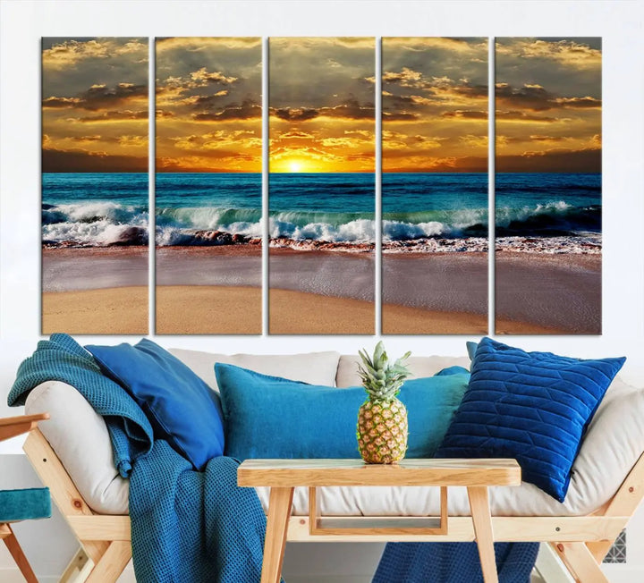 The Ocean Sunrise Over Golden Beach Waves giclee canvas wall art set hangs above, capturing a serene coastal sunset. This high-quality stretched canvas print brings warmth and tranquility to any living space.