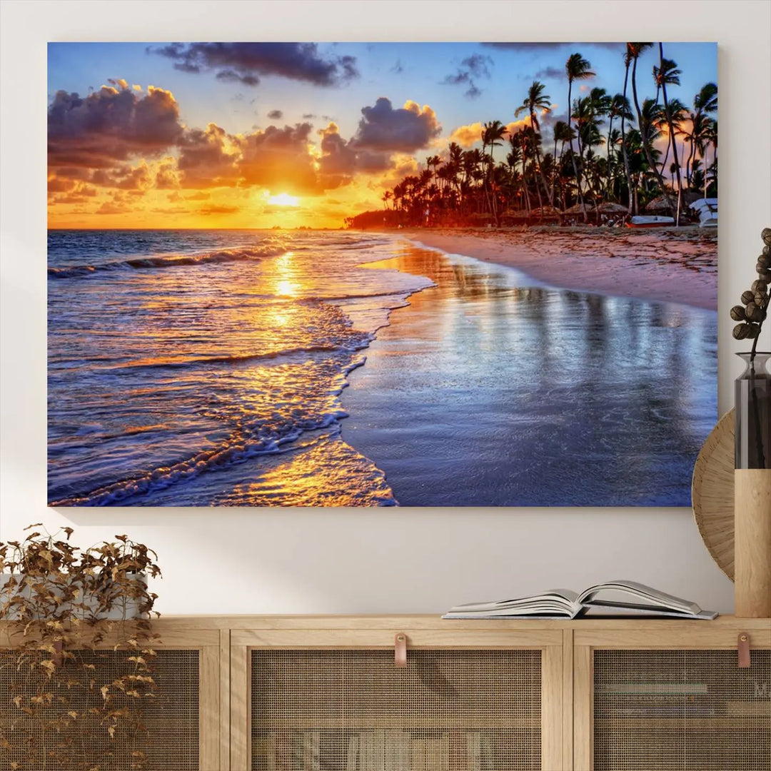 The dining area features a stunning Ocean Sunset Beach Canvas Print—a five-panel coastal wall art and tropical seascape triptych that beautifully captures the serene beauty of ocean waves set against a beach sunset scene.