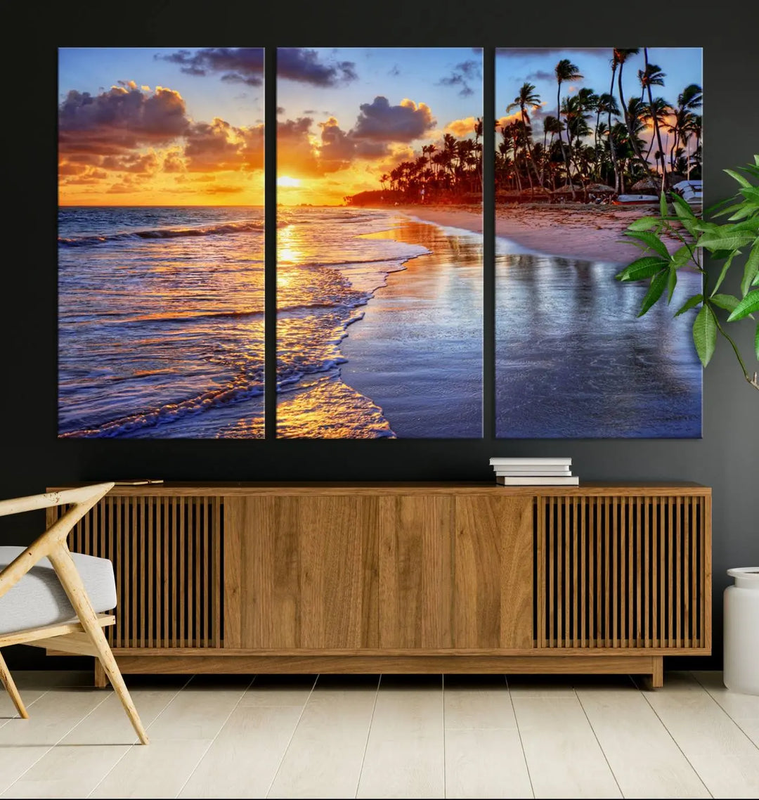 The dining area features a stunning Ocean Sunset Beach Canvas Print—a five-panel coastal wall art and tropical seascape triptych that beautifully captures the serene beauty of ocean waves set against a beach sunset scene.